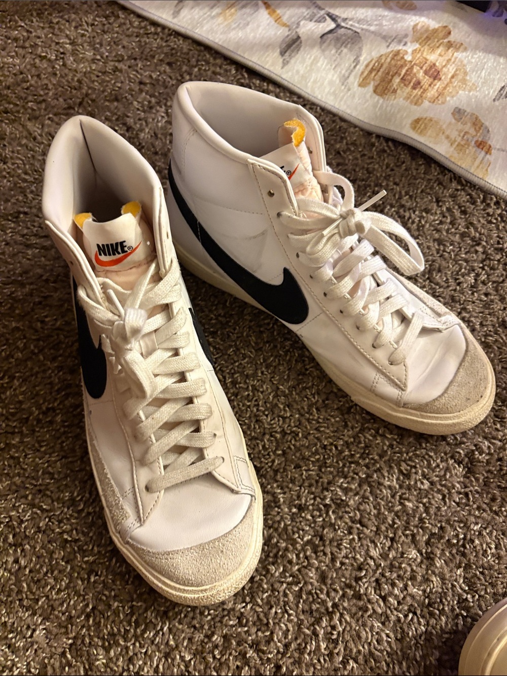 Nike Men’s White High-Top Sneakers with Black Swoosh and Yellow Tongue Detail
